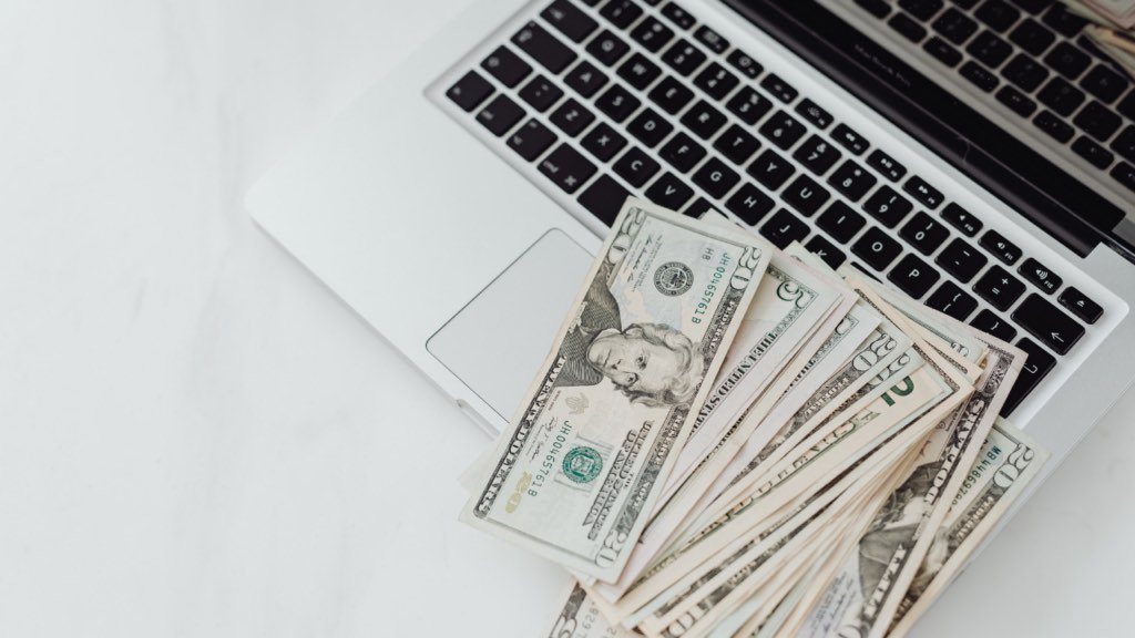 Minnesota immigrant homebuyer reviewing international wire transfer process and timeline to fund their real estate closing from a foreign bank account in the Twin Cities