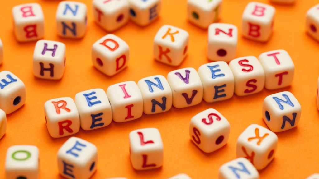 Minnesota home seller reviewing financial investment options with a financial advisor after completing a significant home sale in the Twin Cities