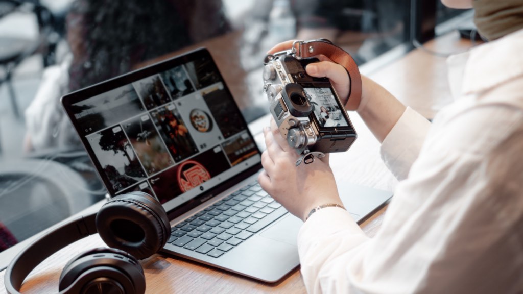 Professional real estate photographer taking listing photos in a bright Minnesota home kitchen to maximize buyer appeal and sale price in the Twin Cities market