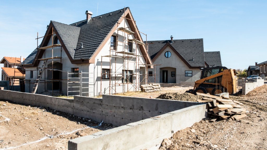 New construction home being built in stages in a Minnesota residential community