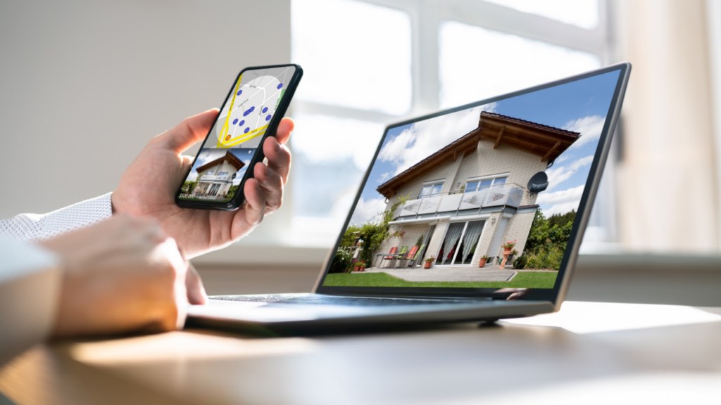 Minnesota home seller reviewing listing appearance on Zillow Realtor.com and Redfin with a Realtor to understand how the home is marketed on major real estate platforms