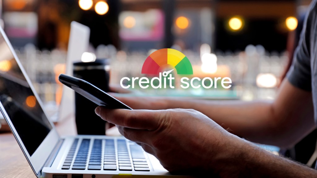 Immigrant homebuyer in Minnesota reviewing credit score improvement actions with a financial advisor to quickly raise their credit score for a Twin Cities home purchase