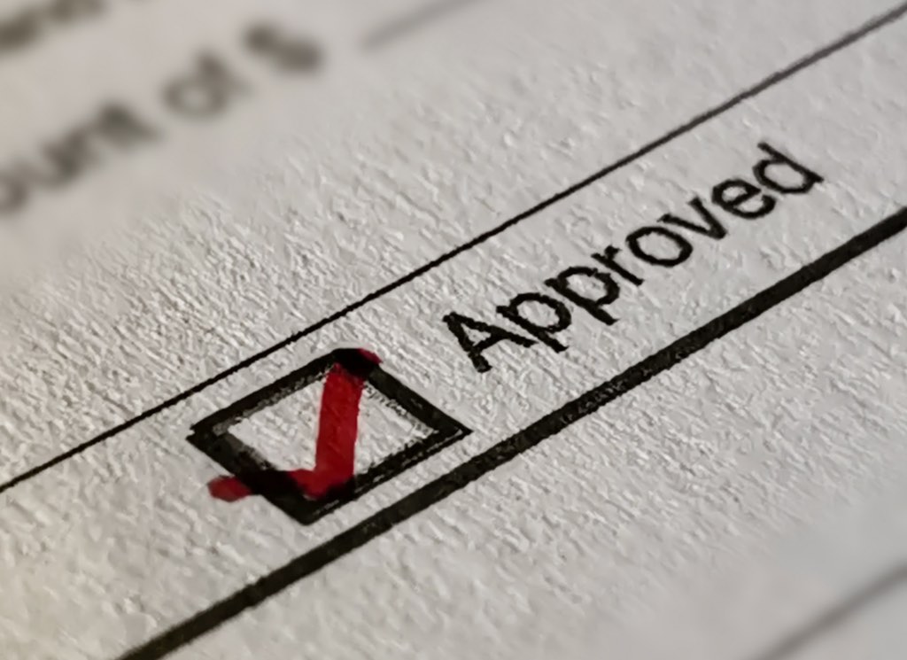 A credit report with an upward trending arrow representing a faster credit update during the mortgage process.