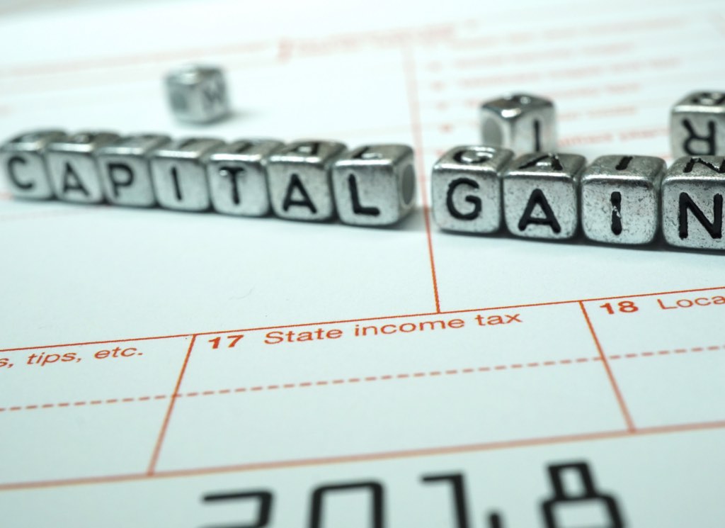 Title card for the article: What Is Capital Gains Tax on Home Sales in Minnesota? (2026 Guide)