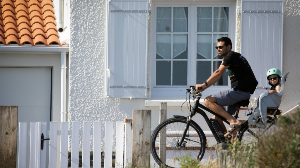 Minnesota homebuyer researching up-and-coming neighborhoods in Minneapolis and Saint Paul reviewing building permit data and commercial investment signals in the Twin Cities