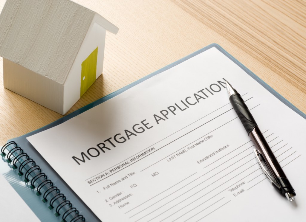 A Minnesota homebuyer comparing different mortgage loan options including conventional, FHA, VA, and USDA loans.