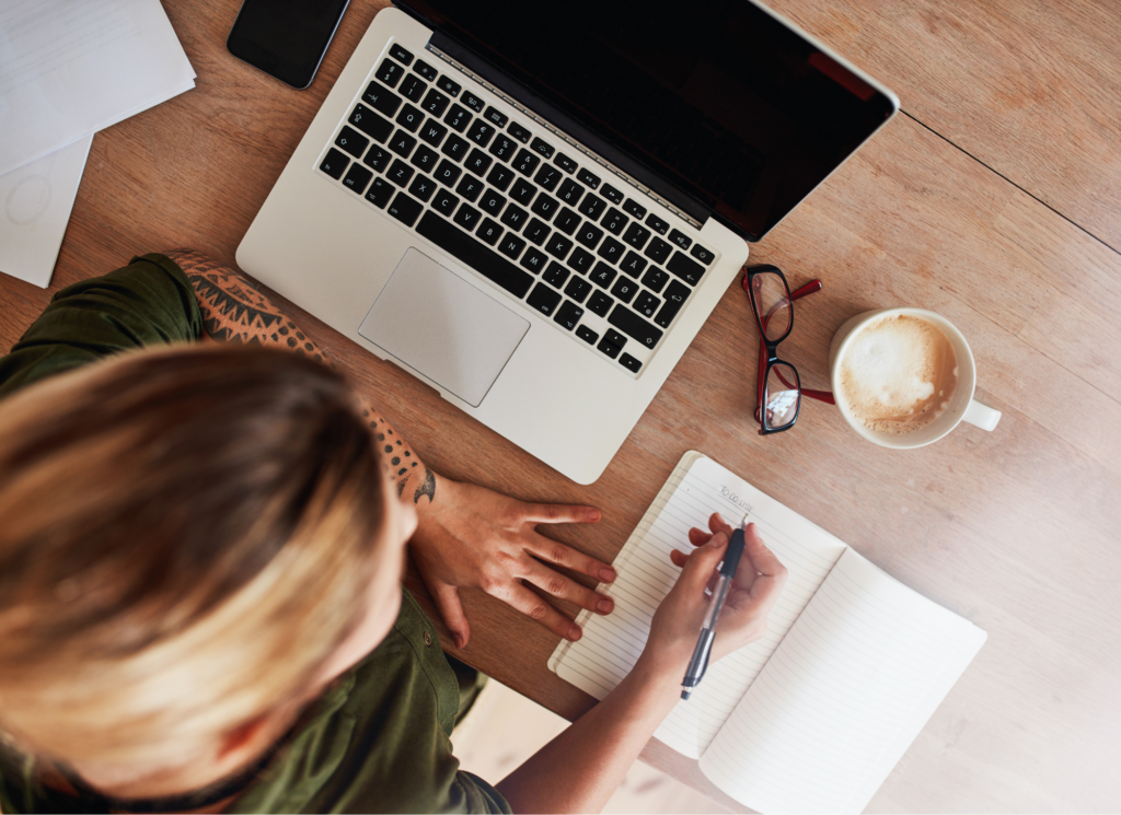 Real estate agent explaining home selling process to Minnesota homeowner outside house