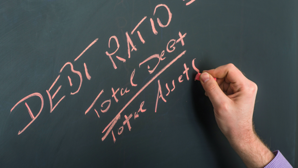 Minnesota homebuyer reviewing debt-to-income ratio calculations and mortgage affordability documents