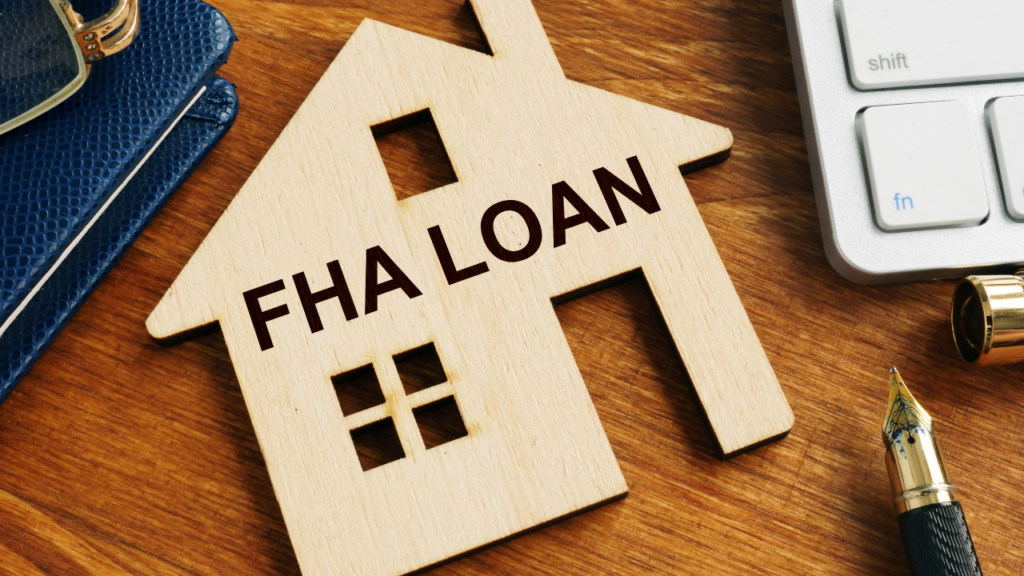 First-time homebuyer reviewing FHA mortgage documents with lender in Minnesota