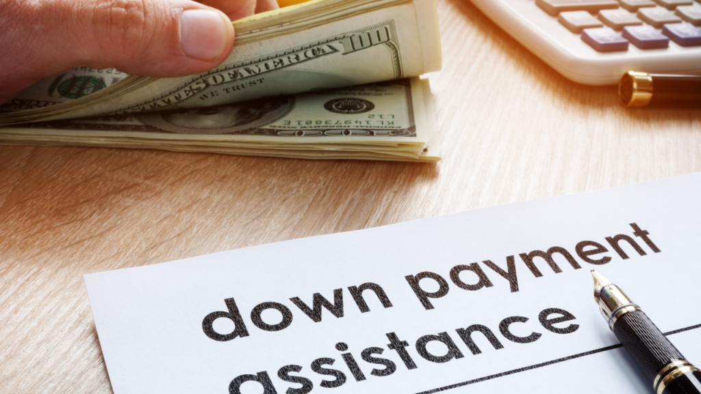 First-time homebuyers discussing ITIN loan and down payment assistance options with lender in Minnesota