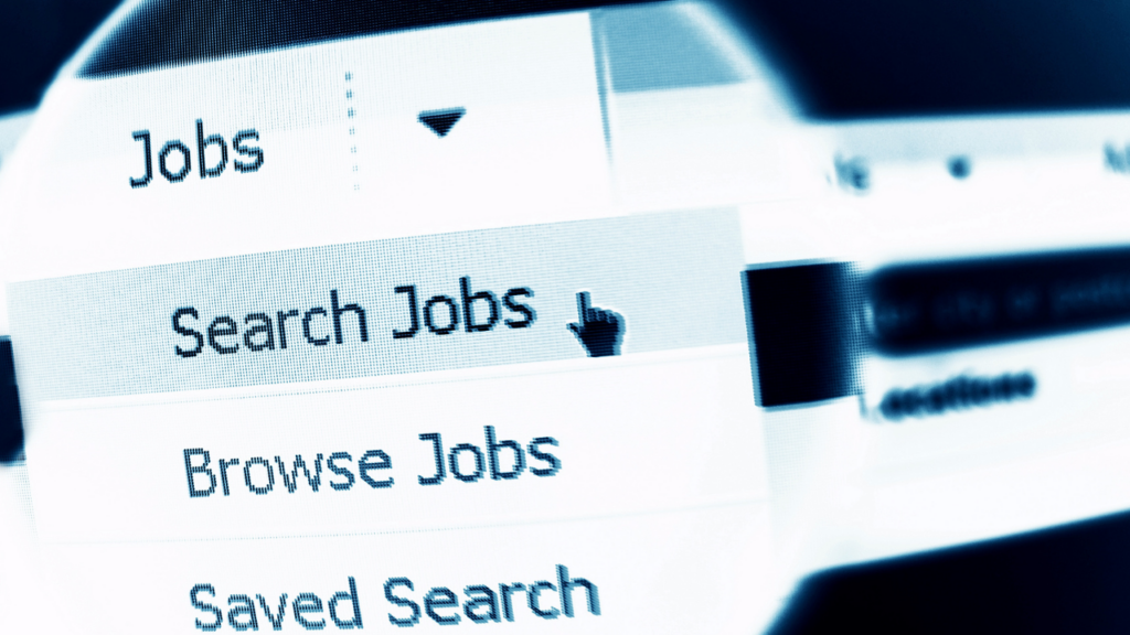 Minnesota homebuyer reviewing employment records and mortgage paperwork before buying a home