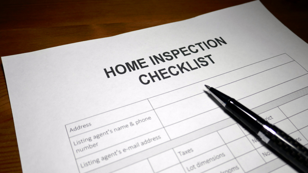 Minnesota homebuyer organizing mortgage application documents and financial paperwork