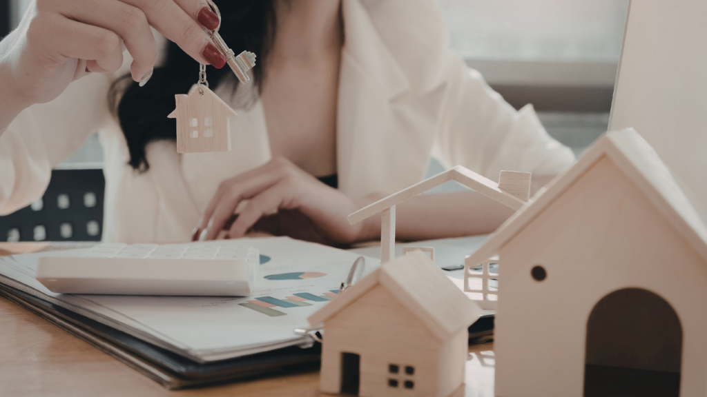 Homebuyer organizing bank statements and transfer records needed for mortgage approval in Minnesota