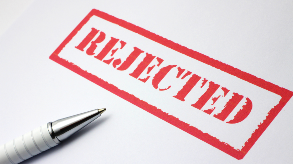 Buyer reacting to rejected home offer with agent