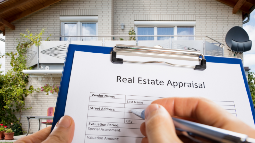 Immigrant homebuyer reviewing a home appraisal report with a Minnesota real estate agent
