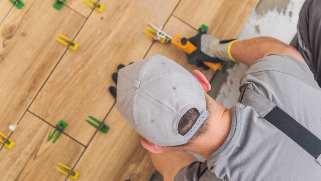 Minnesota homebuyer reviewing kitchen, flooring, and design upgrade options in a new construction model home
