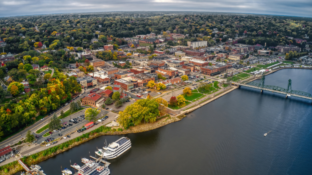 Family exploring suburban neighborhoods in Minnesota while comparing housing and living costs