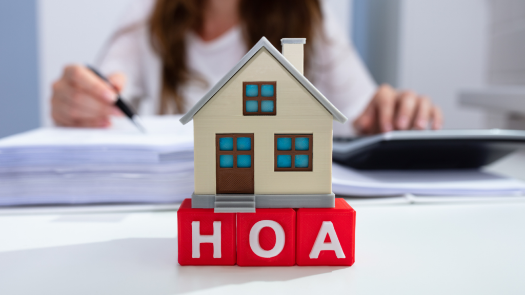 Immigrant homebuyer reviewing HOA documents before purchasing a home in Minnesota