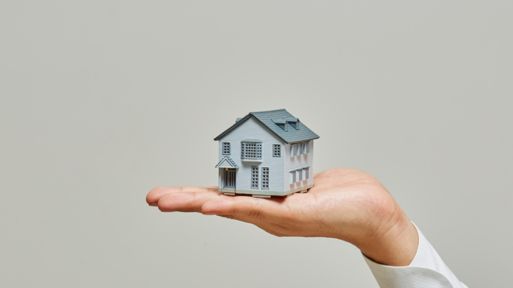 Immigrant homeowner living in a duplex while generating rental income from another unit in Minnesota