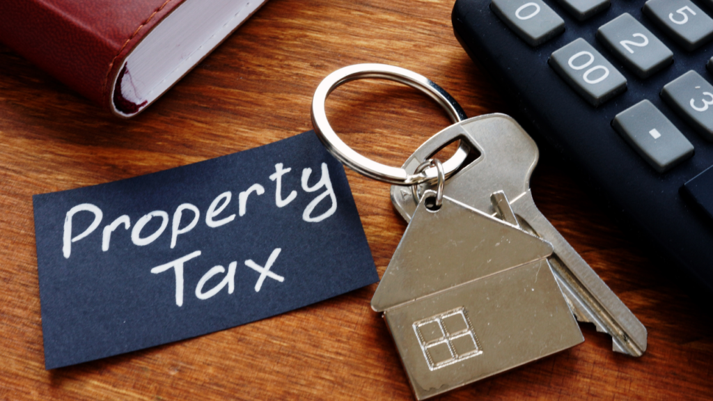 Minnesota homebuyer reviewing property tax calculations while comparing homes