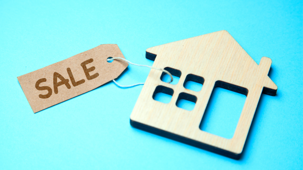 Minnesota homeowner reviewing mortgage rate trends while deciding whether to sell a home