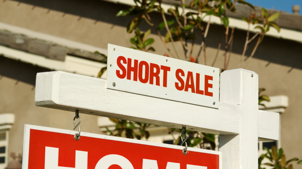 Minnesota homebuyer reviewing a short sale property opportunity before making an offer