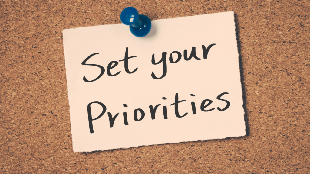 First-time homebuyer in Minnesota sitting with a Realtor reviewing a priority checklist for buying their first home