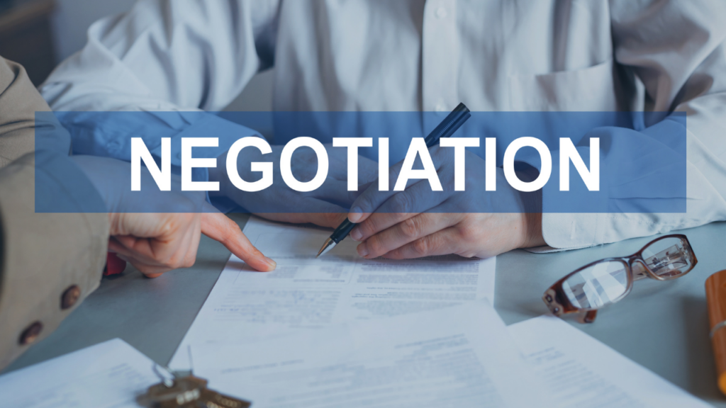 Minnesota home seller reviewing pricing strategy with their Realtor to understand whether pricing above market value leaves room for negotiation in the Twin Cities