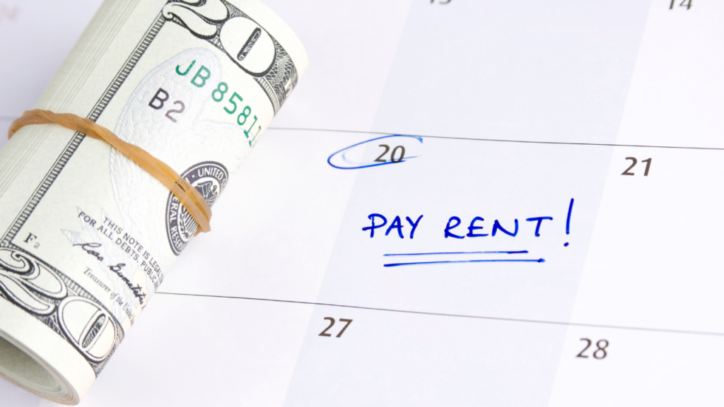 Immigrant renter in Minnesota reviewing rent payment history documentation with a financial advisor to understand how rental payments can help build credit for a home purchase in the Twin Cities