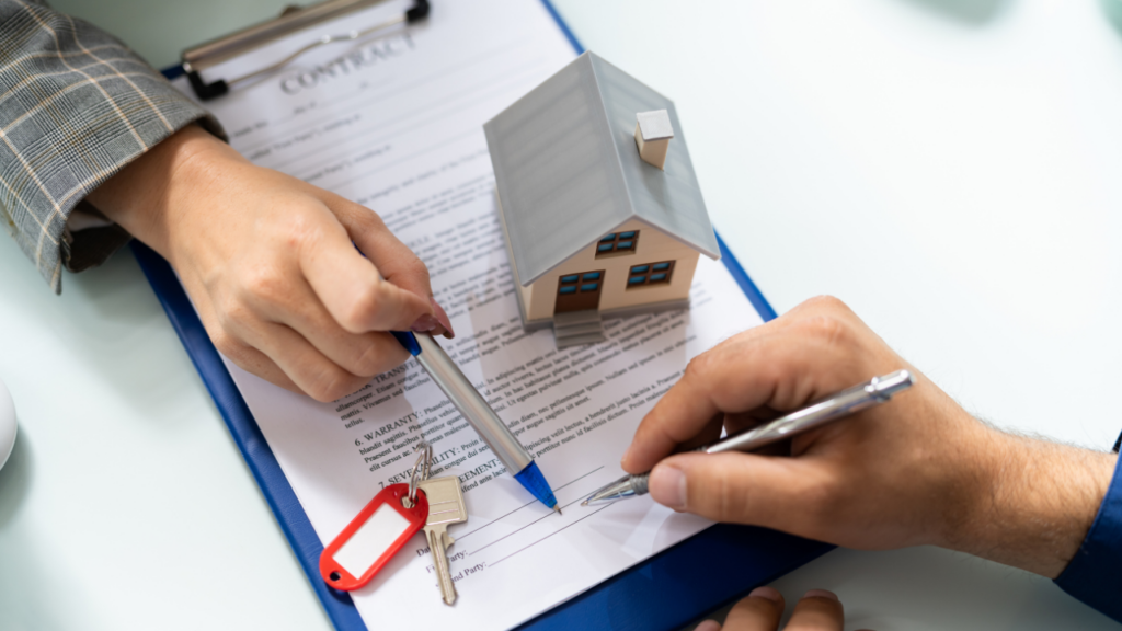 Immigrant homebuyer organizing mortgage documentation including passport visa pay stubs and bank statements to apply for a home loan in Minnesota
