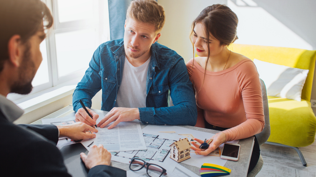 Minnesota homebuyer reviewing a counteroffer document with their Realtor during the negotiation process in the Twin Cities