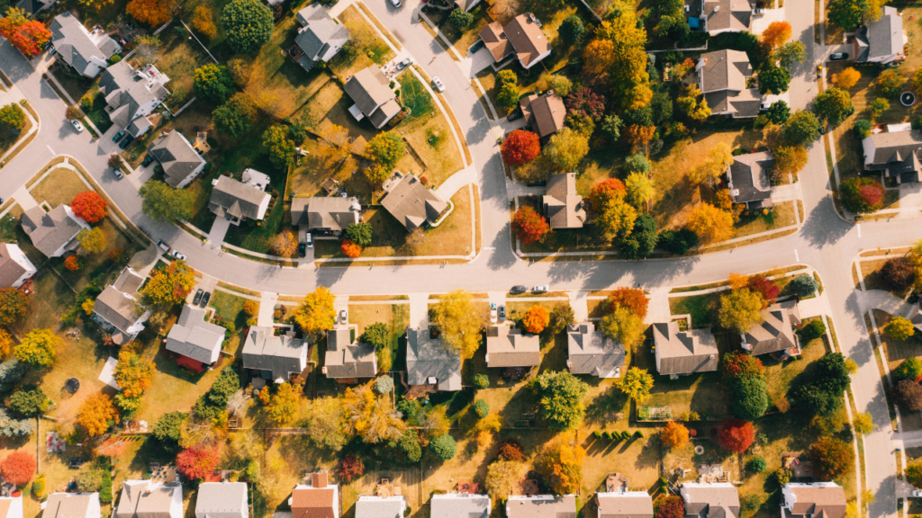 Minnesota homebuyer exploring different Twin Cities suburbs during house hunting visits comparing community character and amenities