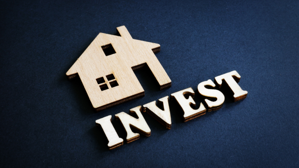 Minnesota homeowner reviewing rental investment strategy documents and financial analysis for converting their primary residence into a rental investment property in the Twin Cities