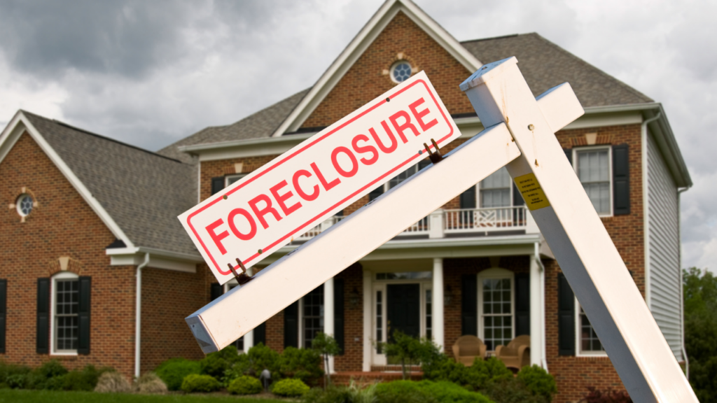 Bank-owned foreclosure home in a Minnesota neighborhood representing the risks and due diligence required when purchasing a foreclosed property in the Twin Cities