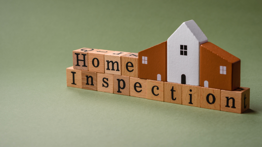 Minnesota homebuyer reviewing a home inspection report with their Realtor after a Twin Cities home inspection revealed findings requiring evaluation