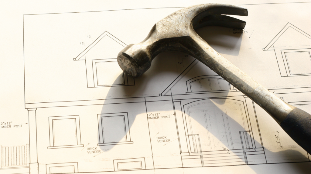 Minnesota homeowner reviewing home improvement plans with a Realtor evaluating which projects add the most resale value in the Twin Cities market