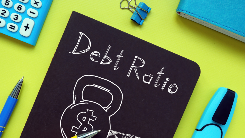 Minnesota homebuyer reviewing debt-to-income ratio calculation with a mortgage lender in the Twin Cities to understand mortgage qualification