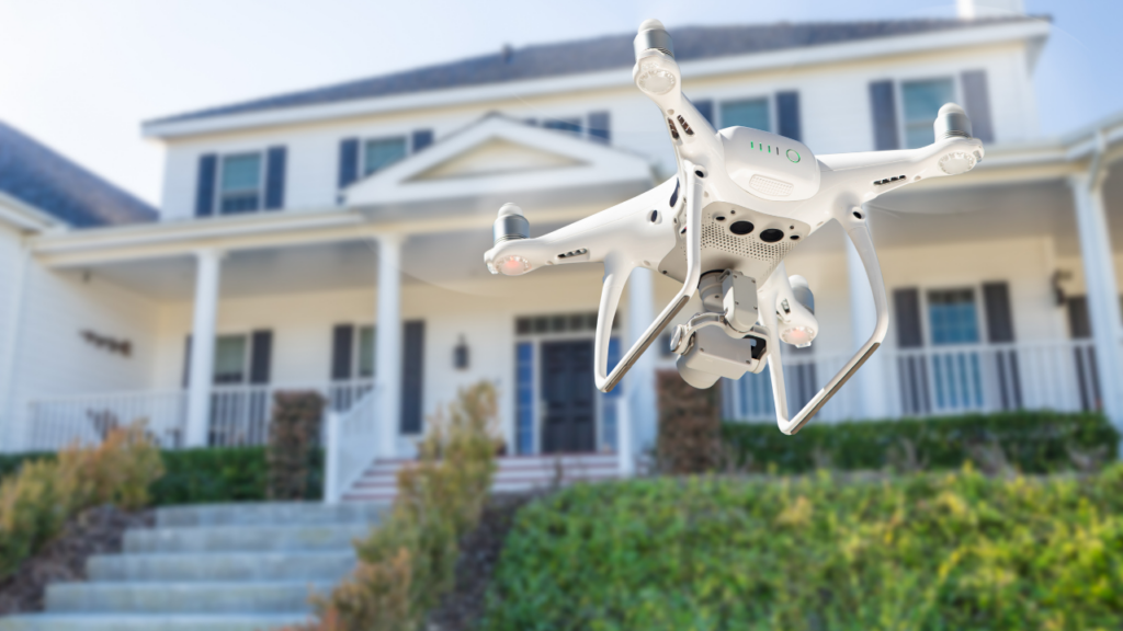 Real estate drone capturing aerial footage of a Minnesota home with lakefront property and large lot for listing marketing in the Twin Cities
