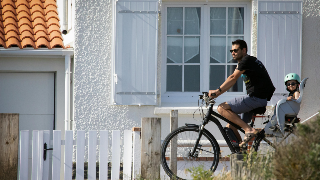 Minnesota homebuyer researching up-and-coming neighborhoods in Minneapolis and Saint Paul reviewing building permit data and commercial investment signals in the Twin Cities