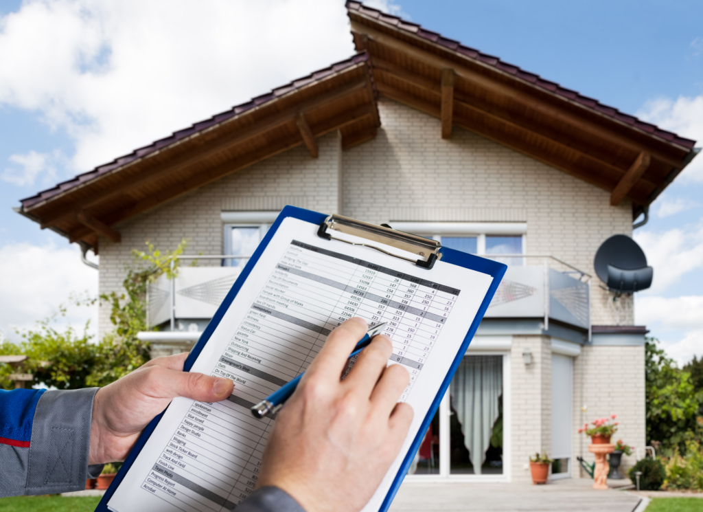 A Minnesota home with a clipboard and documents representing home valuation before listing.